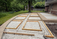 Secondary preparation of exposed aggregate border for decorative concrete patio