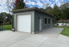 14' x 35' Detached 1 Car Garage with hip roof system, steel siding, 9' walls, and poured wall foundation